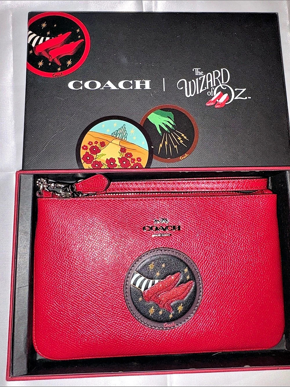 NWT FULL INCLUSION RARE Coach Wizard of Oz Apple Wristlet in Red.